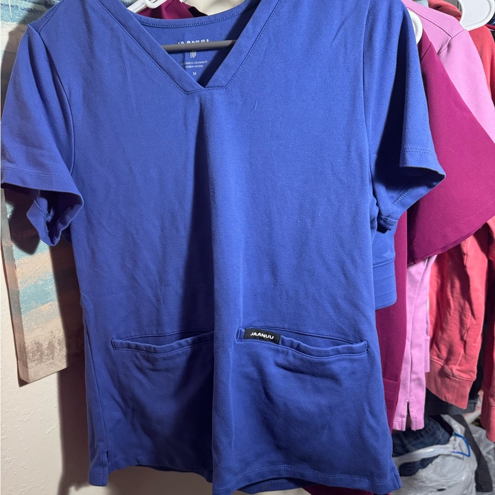 Jaanuu Royal Blue V-Neck Tee and scrub bottoms